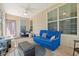 Relaxing sunroom with cozy seating and lots of natural light through the windows at 221 Rivers Edge Dr., Conway, SC 29526