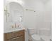 Bathroom featuring wood cabinets, gold hardware, single vanity, and walk-in shower at 2241 Sand Dunes Dr., Myrtle Beach, SC 29577
