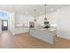 Bright and spacious kitchen with white cabinets, stone countertops, and stainless steel appliances at 2241 Sand Dunes Dr., Myrtle Beach, SC 29577