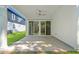 Covered patio featuring overhead fan and sliding glass doors, providing seamless indoor-outdoor living at 2241 Sand Dunes Dr., Myrtle Beach, SC 29577