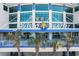 Welcoming entrance to the Avista Resort featuring palm trees and stylish architectural design at 300 N Ocean Blvd. # 128, North Myrtle Beach, SC 29582