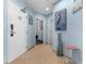Inviting entryway with tiled floor, coastal decor, and convenient access to the bedrooms at 300 N Ocean Blvd. # 128, North Myrtle Beach, SC 29582