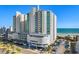 Beautiful oceanfront resort featuring stylish architecture, balconies, and convenient parking at 300 N Ocean Blvd. # 128, North Myrtle Beach, SC 29582