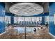 Relaxing indoor hot tub area with comfortable seating, glass block wall, and a serene atmosphere at 300 N Ocean Blvd. # 128, North Myrtle Beach, SC 29582