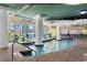 Inviting indoor pool area with ample seating and bright, airy atmosphere for resort guests at 300 N Ocean Blvd. # 128, North Myrtle Beach, SC 29582
