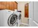 Well-equipped laundry room featuring a front-loading washer and dryer set at 315 14Th Ave. N, Surfside Beach, SC 29575