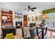 Comfortable living room with a fireplace, built-in bookshelves, hardwood floors, and plenty of natural light at 315 14Th Ave. N, Surfside Beach, SC 29575