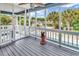 Inviting screened porch overlooking the pool and landscaped backyard at 315 14Th Ave. N, Surfside Beach, SC 29575