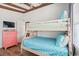 Charming bedroom featuring a bunk bed, wood flooring, and ample natural light at 325 N 58Th Ave. N, North Myrtle Beach, SC 29582