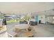 Spacious covered outdoor area for entertaining, with picnic table and sitting area at 325 N 58Th Ave. N, North Myrtle Beach, SC 29582