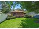 Beautiful backyard with lush green lawn and well-maintained landscaping at 3533 Lighthouse Way, Myrtle Beach, SC 29577