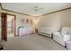 Bright Bedroom featuring a crib, rocker, and colorful decor for a playful environment at 3533 Lighthouse Way, Myrtle Beach, SC 29577