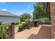 Spacious wooden deck ideal for outdoor entertaining, complete with a grill and yard at 3533 Lighthouse Way, Myrtle Beach, SC 29577
