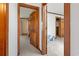 Hallway with multiple doorways leading to carpeted rooms with white walls and trim at 3533 Lighthouse Way, Myrtle Beach, SC 29577