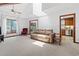 Bright and spacious living room with high ceilings and a view into the kitchen at 3533 Lighthouse Way, Myrtle Beach, SC 29577