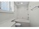Serene bathroom featuring a soaking tub and shower combination with bright natural light at 3835 Masters Ct. # 135, Myrtle Beach, SC 29577