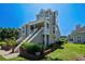 Beautiful multi-story townhome with well-maintained landscaping and a serene setting at 3835 Masters Ct. # 135, Myrtle Beach, SC 29577