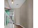 Bright entryway featuring hardwood floors and a staircase leading to the upper level at 3835 Masters Ct. # 135, Myrtle Beach, SC 29577