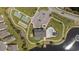 Overhead view of community amenities: pool, tennis courts, parking, firepit, putting green and lakeside dock at 4051 Mclamb Ave. # 4051, Little River, SC 29566