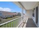 View from the balcony featuring white railings, a covered ceiling, and neighborhood views at 4051 Mclamb Ave. # 4051, Little River, SC 29566