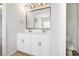 Bathroom showcasing double sink vanity with drawers and a framed mirror at 4051 Mclamb Ave. # 4051, Little River, SC 29566