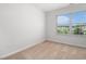 Bedroom with neutral carpet and one window allowing natural light and outside views at 4051 Mclamb Ave. # 4051, Little River, SC 29566
