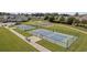 Wide shot of community pickleball courts bordered by landscaping, providing an active recreational space at 4051 Mclamb Ave. # 4051, Little River, SC 29566