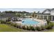 An expansive pool area with plentiful lounge chairs, perfect for relaxation and recreation by the water's edge at 4051 Mclamb Ave. # 4051, Little River, SC 29566
