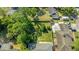 A high-angle view displays the house with a spacious, green backyard and established trees at 4502 Boxwood St., Myrtle Beach, SC 29577