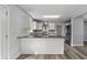 Eat-in kitchen featuring white cabinets, stone countertops, and stainless steel appliances at 4502 Boxwood St., Myrtle Beach, SC 29577