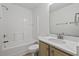 Bathroom features a tub/shower combo and a vanity with a white countertop and plenty of storage space at 4539 Fringetree Dr., Murrells Inlet, SC 29576