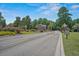 Elegant community entrance featuring manicured landscaping, brick pillars, and a security gate at 4539 Fringetree Dr., Murrells Inlet, SC 29576