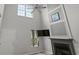 Bright and airy living room with high ceilings, fireplace, wood-look floors, and ample natural light at 4539 Fringetree Dr., Murrells Inlet, SC 29576