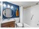 Bathroom features a vanity, commode, tub/shower combination, and nautical decor at 517 S Ocean Blvd. # 705, North Myrtle Beach, SC 29582