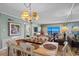 Relaxing dining area with seating for six, stylish lighting, and coastal views at 517 S Ocean Blvd. # 705, North Myrtle Beach, SC 29582