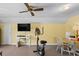 Spacious basement with workout equipment, and yellow walls at 528 George Washington Trail, Georgetown, SC 29440