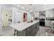 Spacious kitchen with a large island, stainless steel appliances, and ample storage at 528 George Washington Trail, Georgetown, SC 29440