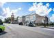 Street view of a historic commercial buildings, clock tower, and on-street parking at 528 George Washington Trail, Georgetown, SC 29440
