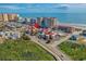 Aerial view showing buildings near the beach and ocean, with a community layout at 609 Hillside Dr. S # D-17, North Myrtle Beach, SC 29582