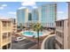 Aerial view of pool, parking lot, and surrounding buildings from the condominium at 609 Hillside Dr. S # D-17, North Myrtle Beach, SC 29582