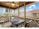 Balcony view shows outside seating, a ceiling fan, and a building in the distance at 609 Hillside Dr. S # D-17, North Myrtle Beach, SC 29582