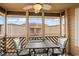 Balcony view from this property, with outside seating and a ceiling fan at 609 Hillside Dr. S # D-17, North Myrtle Beach, SC 29582