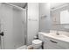 Functional bathroom featuring a glass-enclosed shower, toilet, and vanity with a single sink at 609 Hillside Dr. S # D-17, North Myrtle Beach, SC 29582