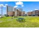Well-maintained lawn with picnic tables and charcoal grill, perfect for outdoor gatherings and relaxation at 609 Hillside Dr. S # D-17, North Myrtle Beach, SC 29582