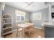 Cozy dining room with seating for four and natural light at 609 Hillside Dr. S # D-17, North Myrtle Beach, SC 29582
