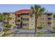 Coastal condo building featuring multiple balconies and lush landscaping at 609 Hillside Dr. S # D-17, North Myrtle Beach, SC 29582
