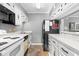 Efficient kitchen features ample storage and counter space with modern appliances at 609 Hillside Dr. S # D-17, North Myrtle Beach, SC 29582