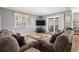 Inviting living room with large TV and sliding door to outdoor patio at 609 Hillside Dr. S # D-17, North Myrtle Beach, SC 29582