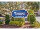 Waipani condos sign with lush landscaping at 609 Hillside Dr. S # D-17, North Myrtle Beach, SC 29582