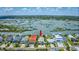 Expansive aerial view showcasing the intercoastal, waterways, and homes of a vibrant coastal community at 624 Dogwood Dr. S, Garden City Beach, SC 29576